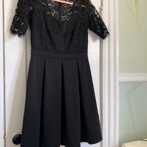 Black fit and flare dress with lace sleeves